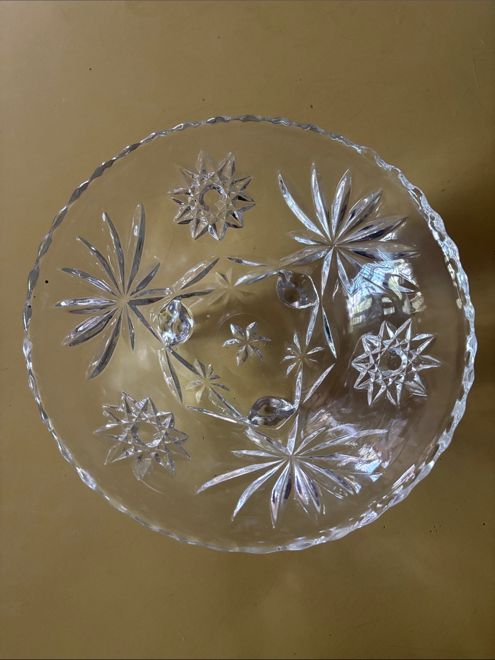 Vintage three footed glass bowl
